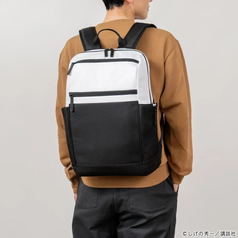 男性がリュックを背負う後ろ姿