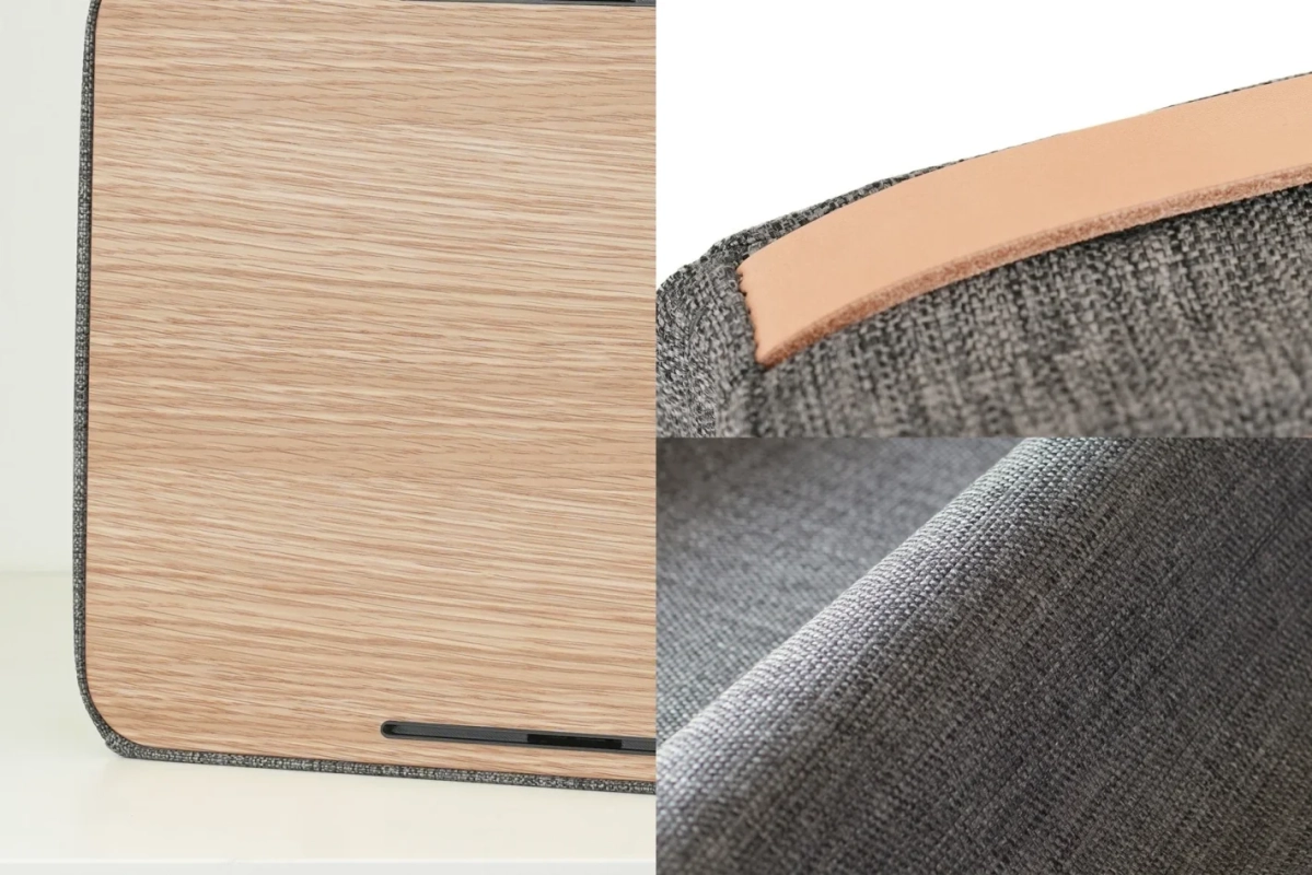 木目調のパネルとグレーのファブリック、革のストラップの素材感
