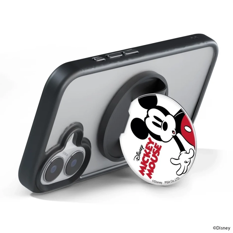 ミッキーマウスのデザインが施されたポップソケットで立てかけられているスマートフォン
