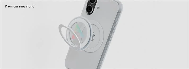 白いスマートフォンにマグネット式の白いリングスタンドが取り付けられ、スタンドとして機能している様子を捉えた画像です。
