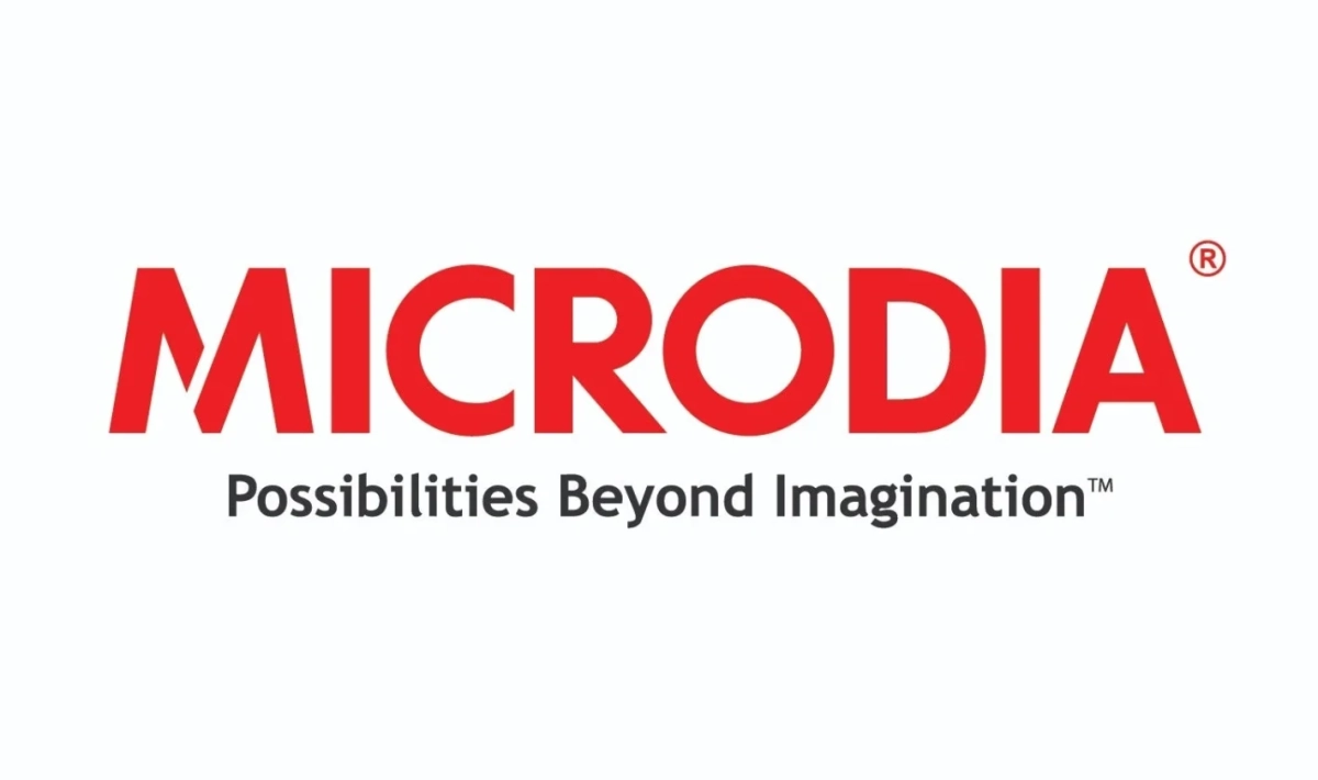 白背景に赤字で「MICRODIA」というロゴが表示されており、その下に黒字で「Possibilities Beyond Imagination™」というスローガンが書かれています。