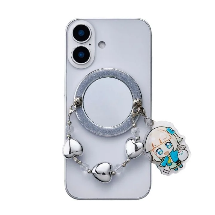 ミラー付きスマホリングとチャームが付いた白いスマートフォン